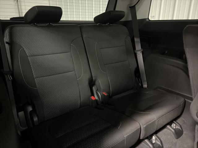 Photo of 2023 Volcanic Red Tintcoat GMC Acadia
