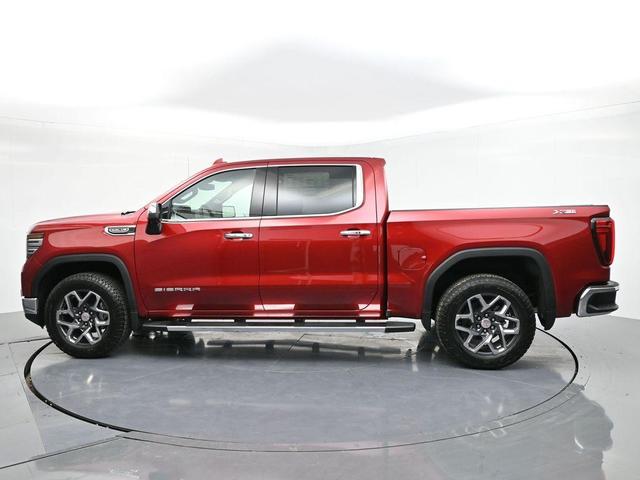 Photo of 2026 Volcanic Red Tintcoat GMC Sierra 1500