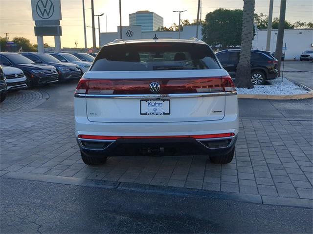 Photo of 2025 Opal White Pearl Volkswagen Atlas Cross Sport