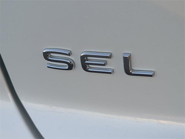 Photo of 2025 Opal White Pearl Volkswagen Atlas Cross Sport