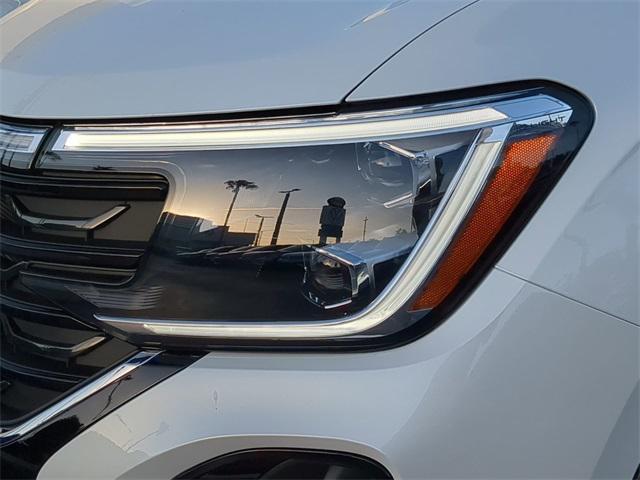 Photo of 2025 Opal White Pearl Volkswagen Atlas Cross Sport