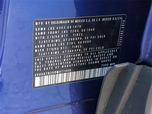 Photo of 2024 Dusk Blue Metallic Volkswagen Taos