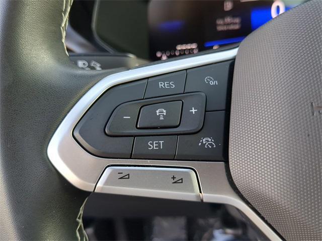 Photo of 2024 Dusk Blue Metallic Volkswagen Taos