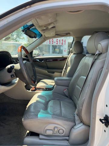 Photo of 2000 White Diamond Cadillac DeVille