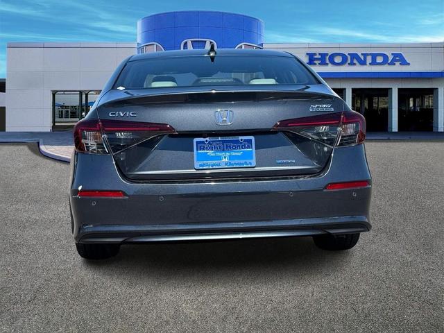 Photo of 2025 Gold Honda Civic Hybrid