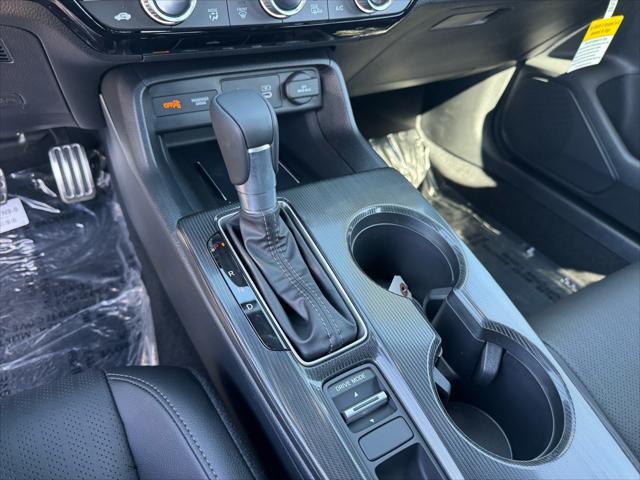 Photo of 2025 Boost Blue Pearl Honda Civic Hybrid