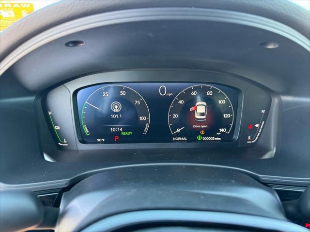 Photo of 2025 Boost Blue Pearl Honda Civic Hybrid