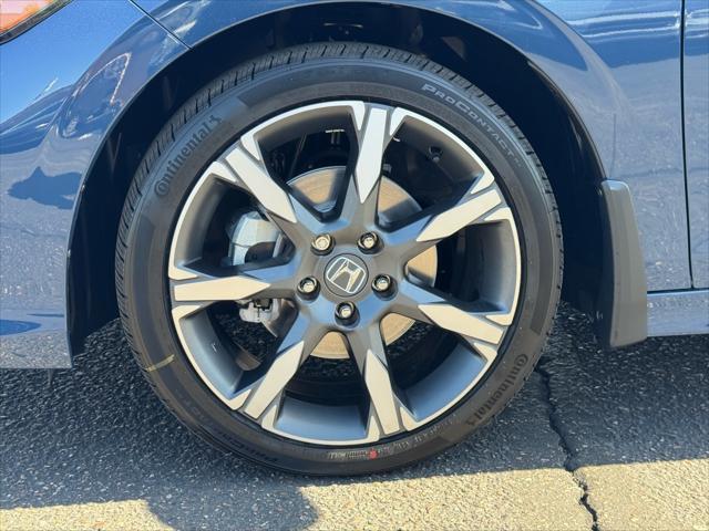 Photo of 2025 Boost Blue Pearl Honda Civic Hybrid