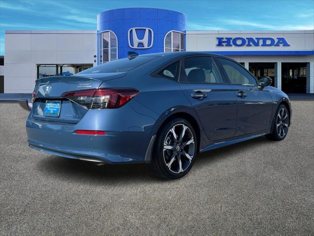 Photo of 2025 Boost Blue Pearl Honda Civic Hybrid