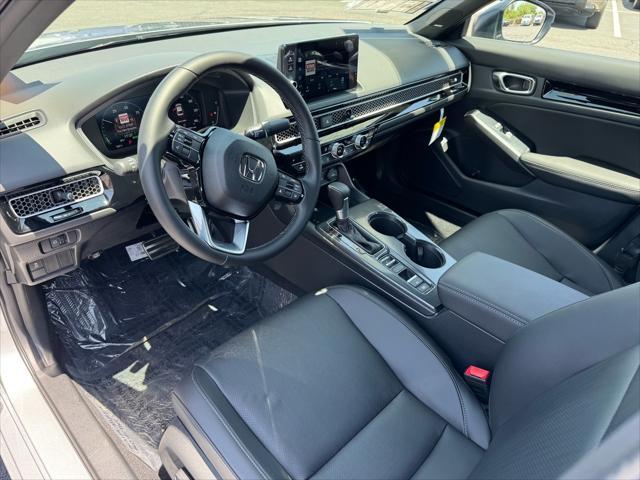 Photo of 2025 Solar Silver Metallic Honda Civic Hybrid
