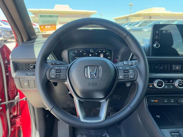 Photo of 2026 Radiant Red Metallic Honda CR-V Hybrid