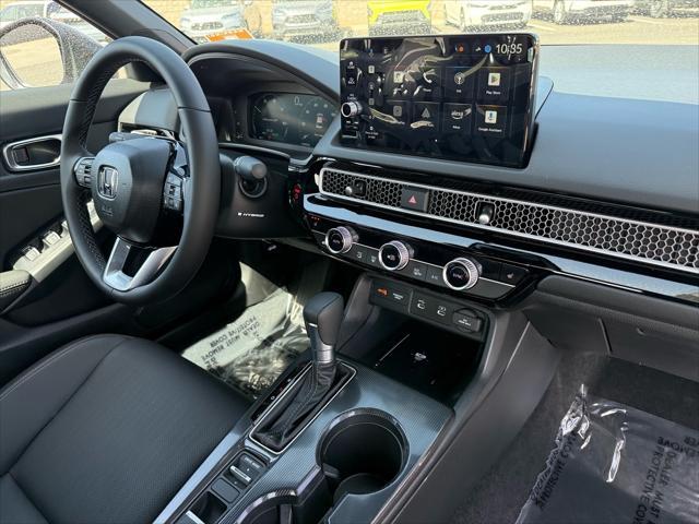 Photo of 2025 Urban Gray Pearl Honda Civic Hybrid
