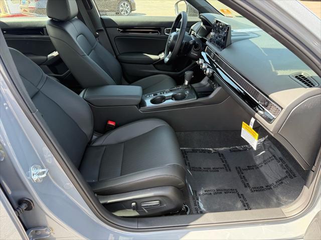 Photo of 2025 Urban Gray Pearl Honda Civic Hybrid