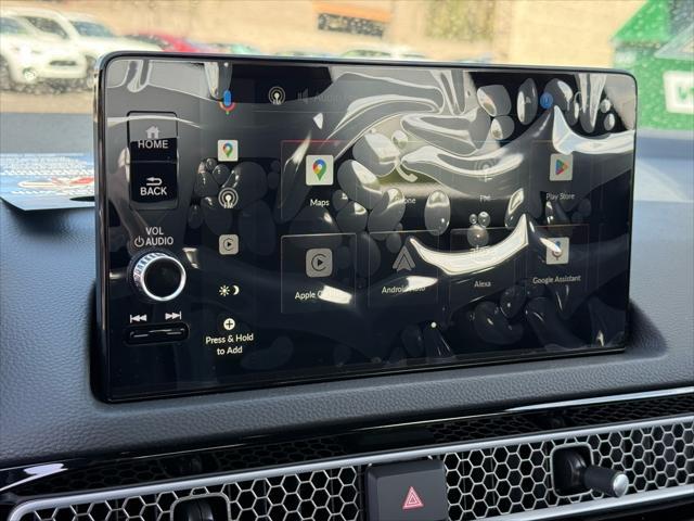 Photo of 2025 Urban Gray Pearl Honda Civic Hybrid