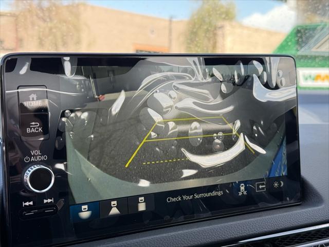 Photo of 2025 Urban Gray Pearl Honda Civic Hybrid