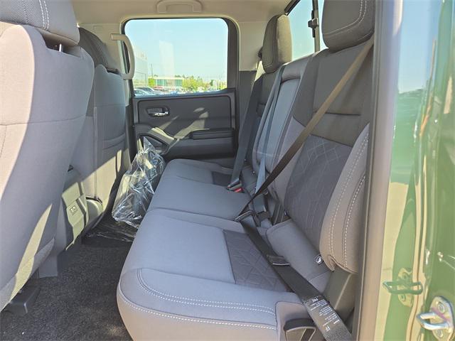 Photo of 2025 Tactical Green Metallic Nissan Frontier