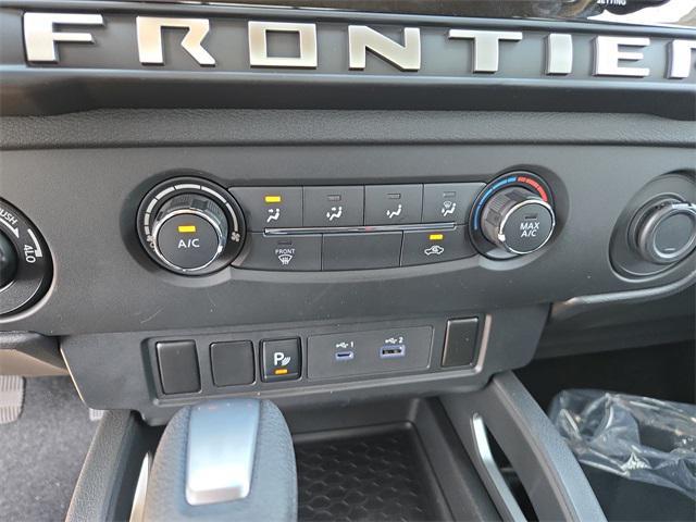 Photo of 2025 Tactical Green Metallic Nissan Frontier