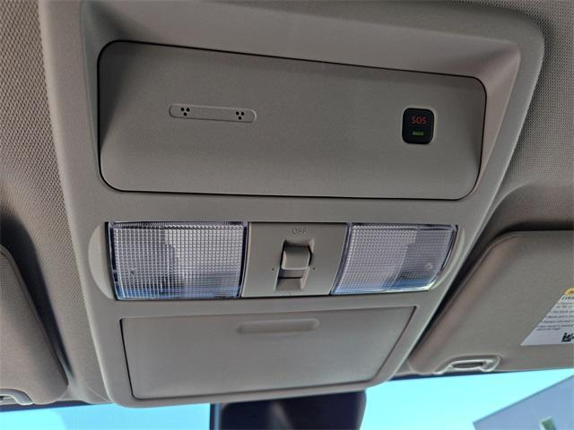 Photo of 2025 Tactical Green Metallic Nissan Frontier