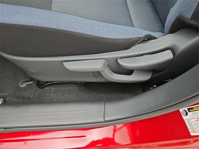 Photo of 2025 Scarlet Ember Tintcoat Nissan Versa