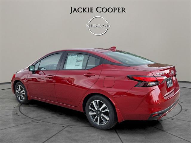 Photo of 2025 Scarlet Ember Tintcoat Nissan Versa