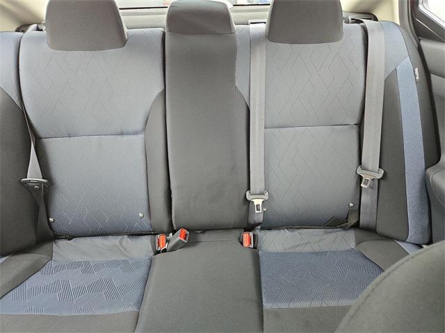 Photo of 2025 Scarlet Ember Tintcoat Nissan Versa