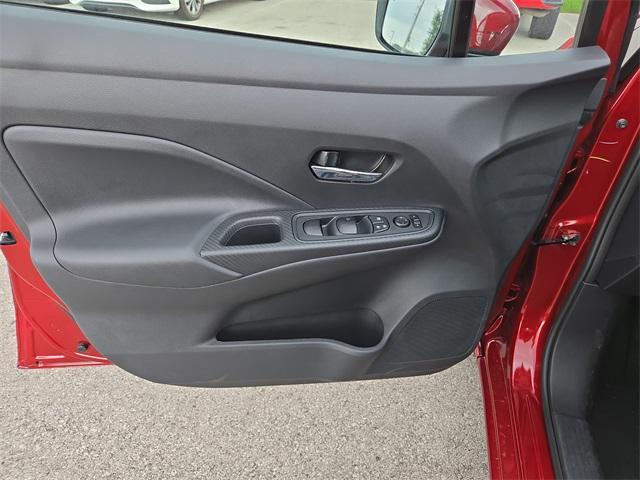 Photo of 2025 Scarlet Ember Tintcoat Nissan Versa