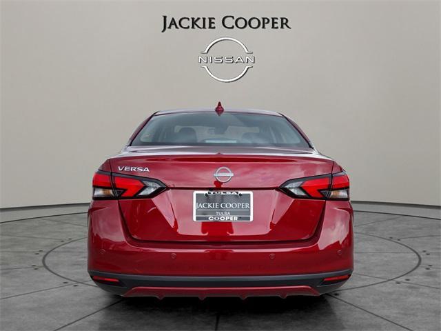 Photo of 2025 Scarlet Ember Tintcoat Nissan Versa