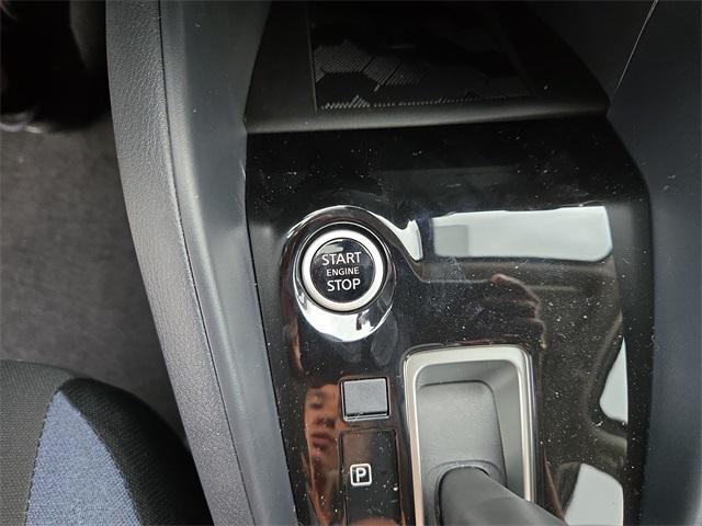 Photo of 2025 Scarlet Ember Tintcoat Nissan Versa