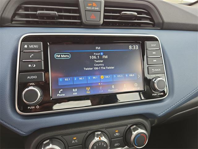 Photo of 2025 Scarlet Ember Tintcoat Nissan Versa
