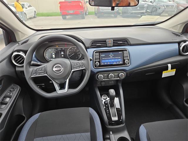 Photo of 2025 Scarlet Ember Tintcoat Nissan Versa