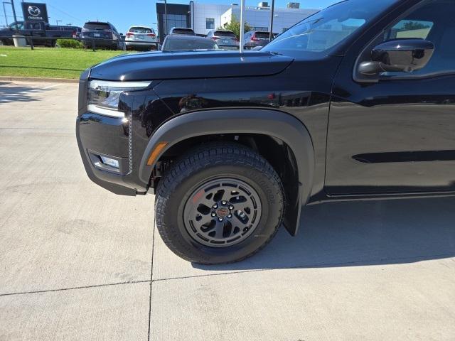 Photo of 2025 Super Black Nissan Frontier