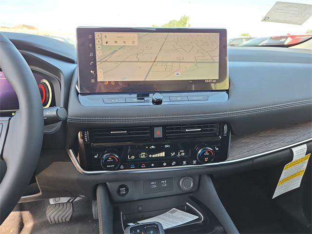 Photo of 2025 Boulder Gray Pearl/Super Black Nissan Rogue