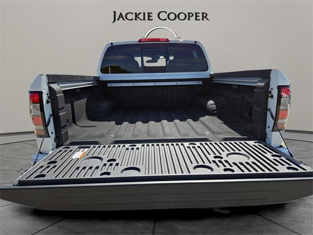 Photo of 2025 Glacier White Nissan Frontier