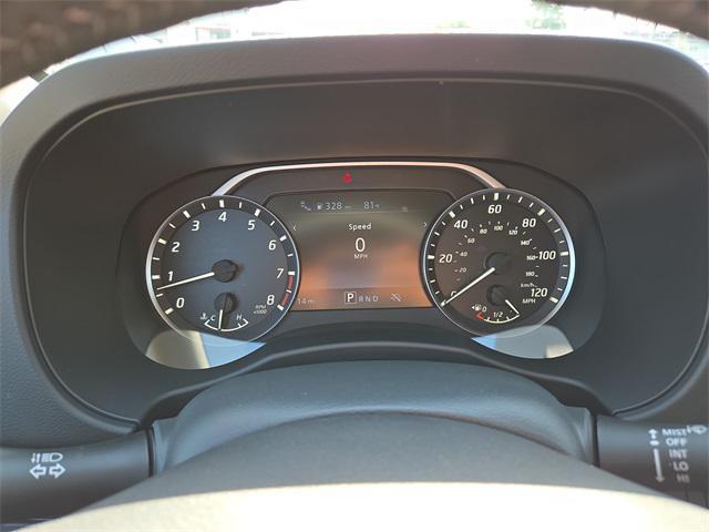 Photo of 2025 Glacier White Nissan Frontier