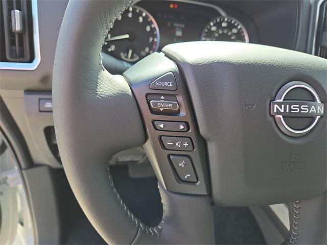 Photo of 2025 Glacier White Nissan Frontier