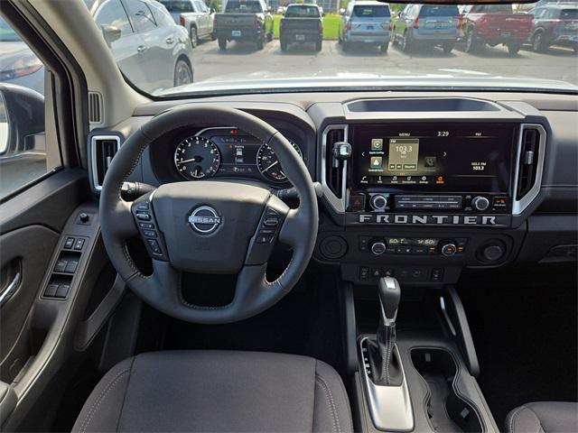 Photo of 2025 Glacier White Nissan Frontier