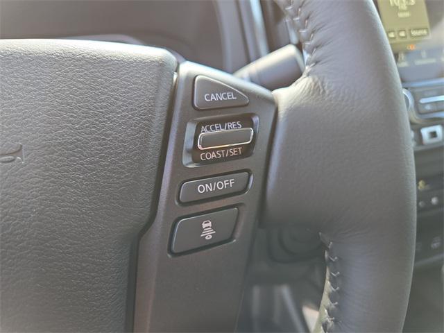 Photo of 2025 Glacier White Nissan Frontier