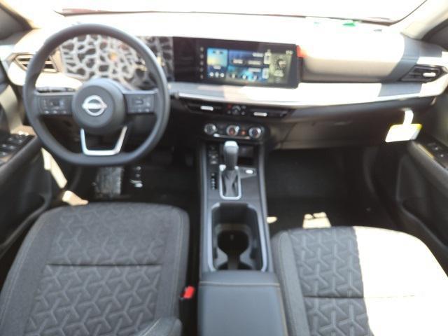 Photo of 2025 Scarlet Ember Tintcoat Nissan Kicks
