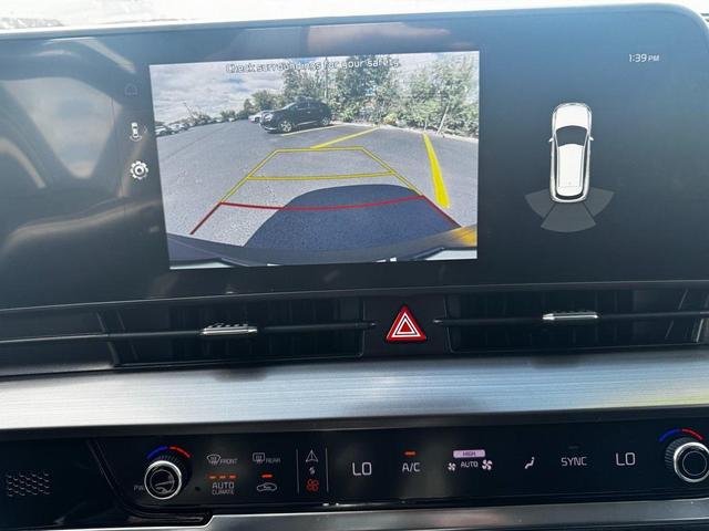 Photo of 2023 Sapphire Blue Kia Sportage