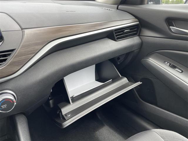Photo of 2024 Super Black Clearcoat Nissan Altima