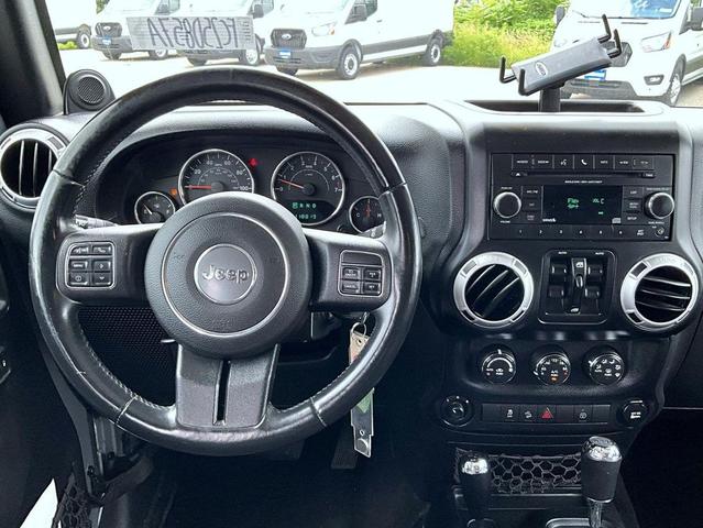 Photo of 2014 Billet Metallic Clearcoat Jeep Wrangler Unlimited