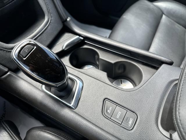 Photo of 2017 Stellar Black Metallic Cadillac XT5