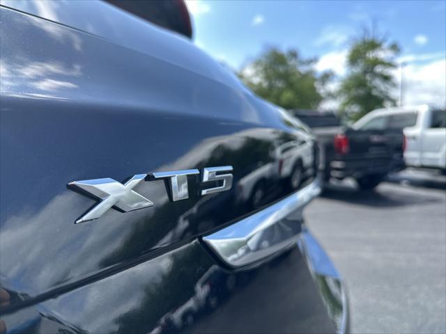 Photo of 2017 Stellar Black Metallic Cadillac XT5