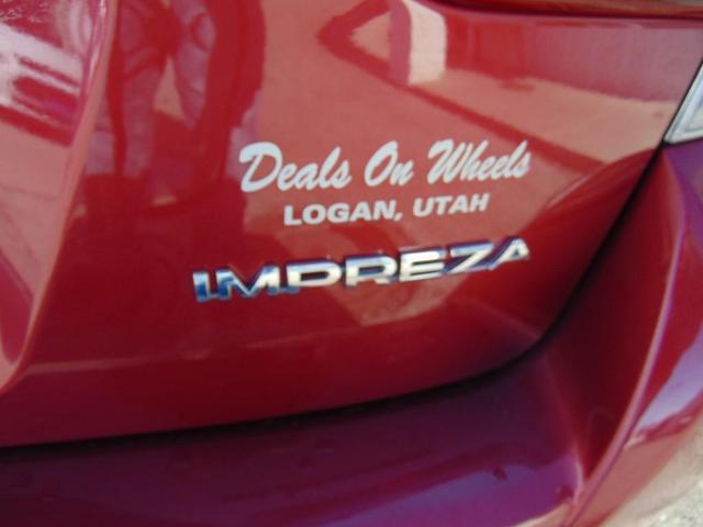 Photo of 2021 Crimson Red Pearl Subaru Impreza