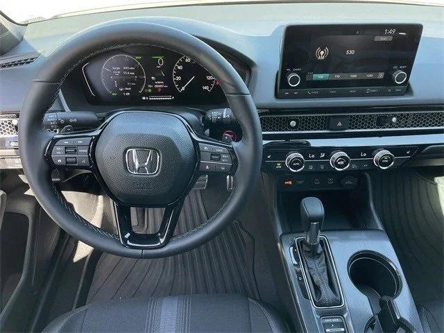 Photo of 2025 Platinum White Pearl Honda Civic Hybrid