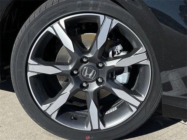 Photo of 2025 Crystal Black Pearl Honda Civic Hybrid