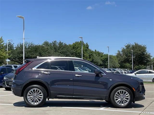 Photo of 2024 Midnight Sky Metallic Cadillac XT4