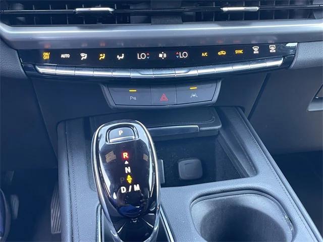 Photo of 2024 Midnight Sky Metallic Cadillac XT4