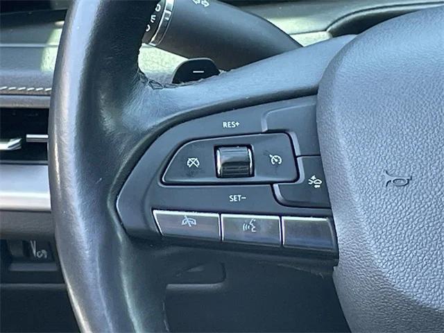 Photo of 2024 Midnight Sky Metallic Cadillac XT4