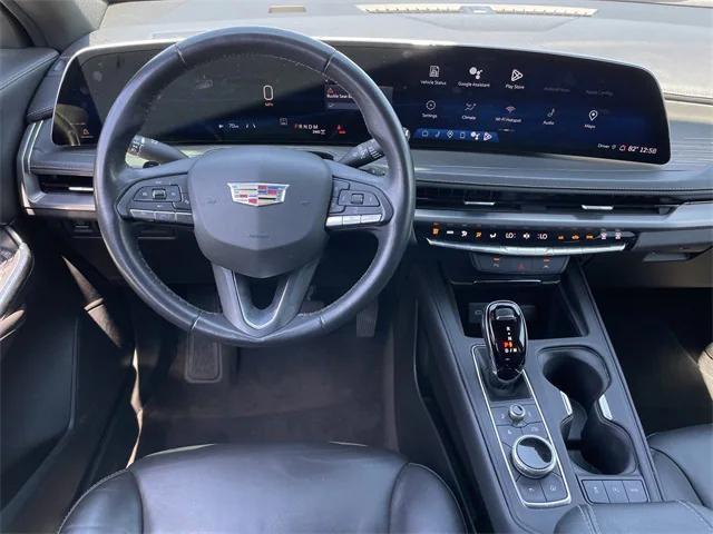 Photo of 2024 Midnight Sky Metallic Cadillac XT4